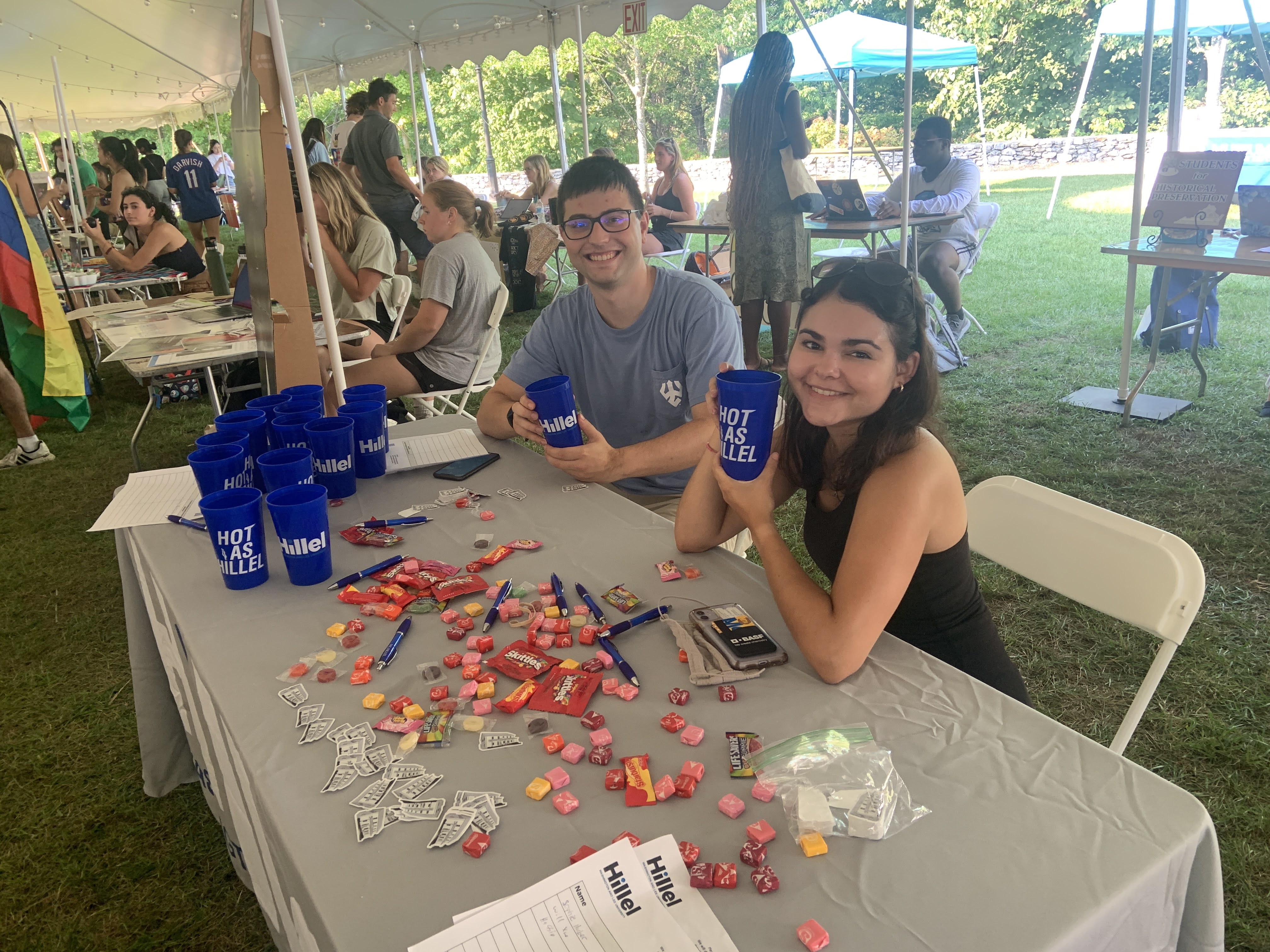 Sam Bluestone '22 and Julia Raskin '24 staff the Hillel table at the Student Activities Fair for new students fall 2021.